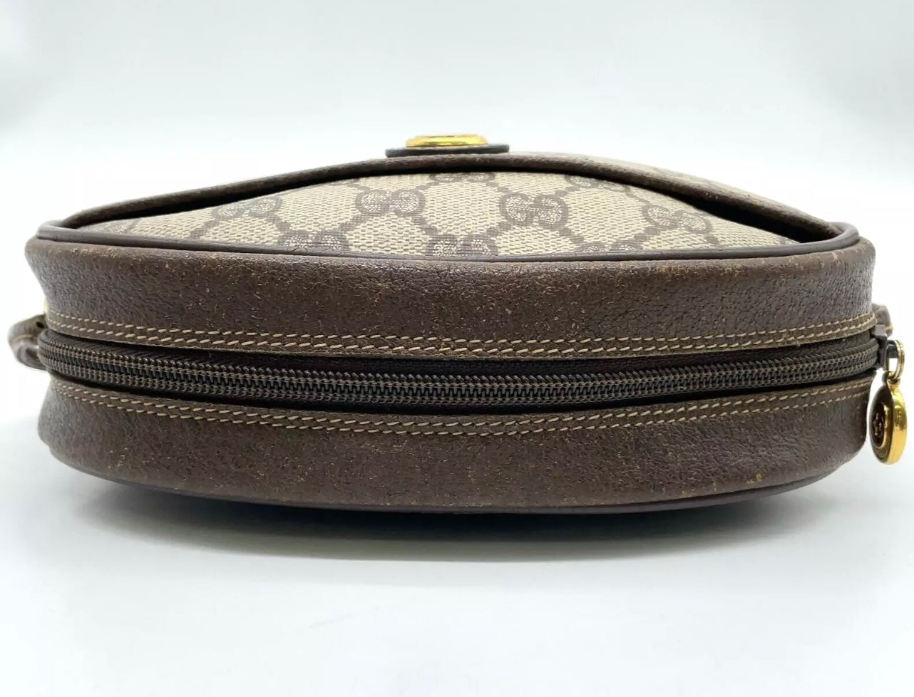 70s / 80s Era Vintage Gucci Monogram Canvas Oval Crossbody Bag – Brown GG Supreme with Leather Trim and Gold-Tone Hardware