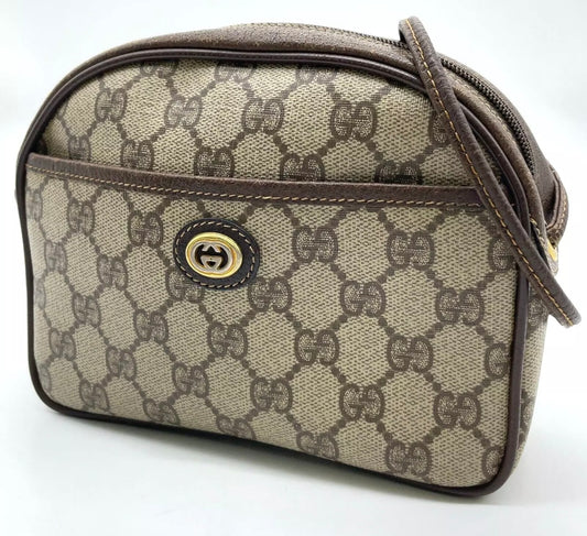 70s / 80s Era Vintage Gucci Monogram Canvas Oval Crossbody Bag – Brown GG Supreme with Leather Trim and Gold-Tone Hardware