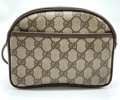 70s / 80s Era Vintage Gucci Monogram Canvas Oval Crossbody Bag – Brown GG Supreme with Leather Trim and Gold-Tone Hardware